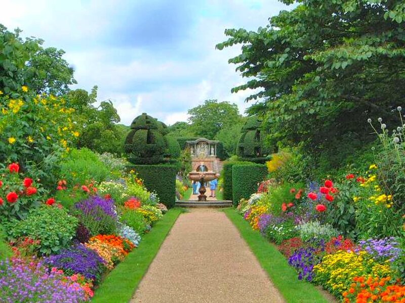 Colorful garden path with fountain