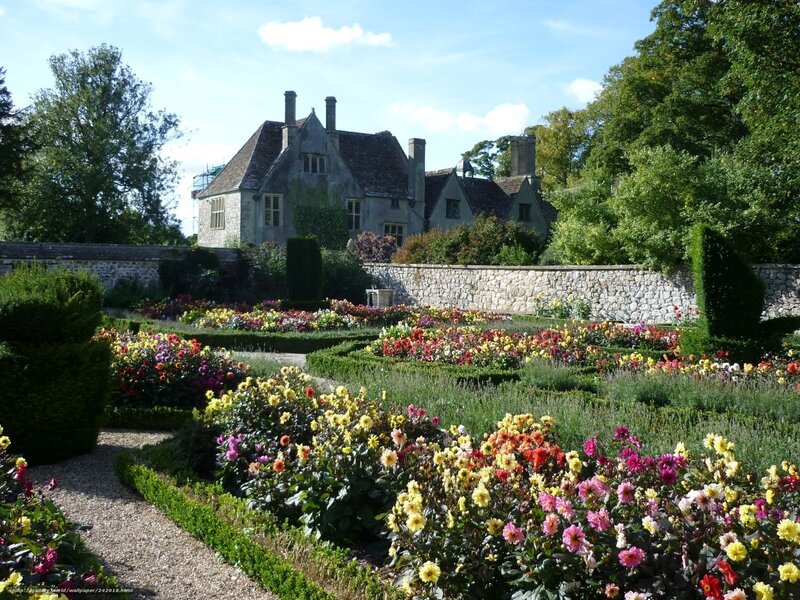 Colorful garden with stone house
