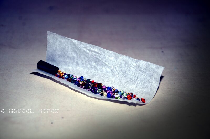 Colorful gems on paper