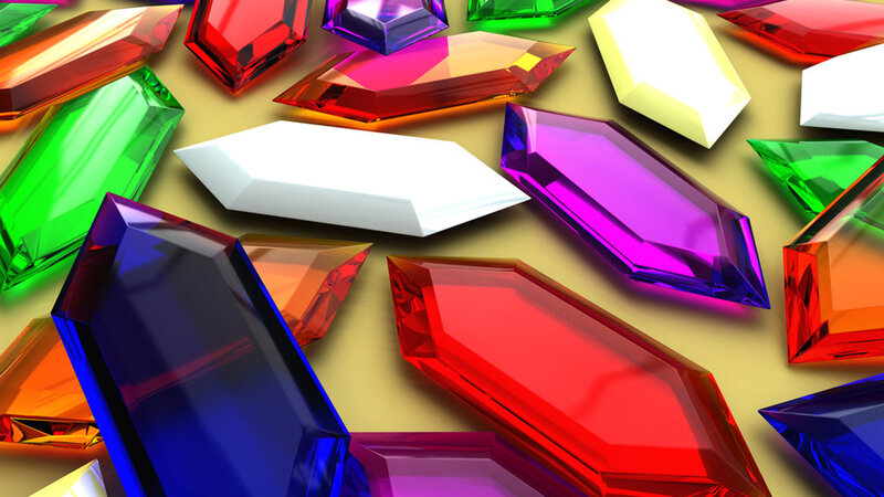 colorful gemstones on gold