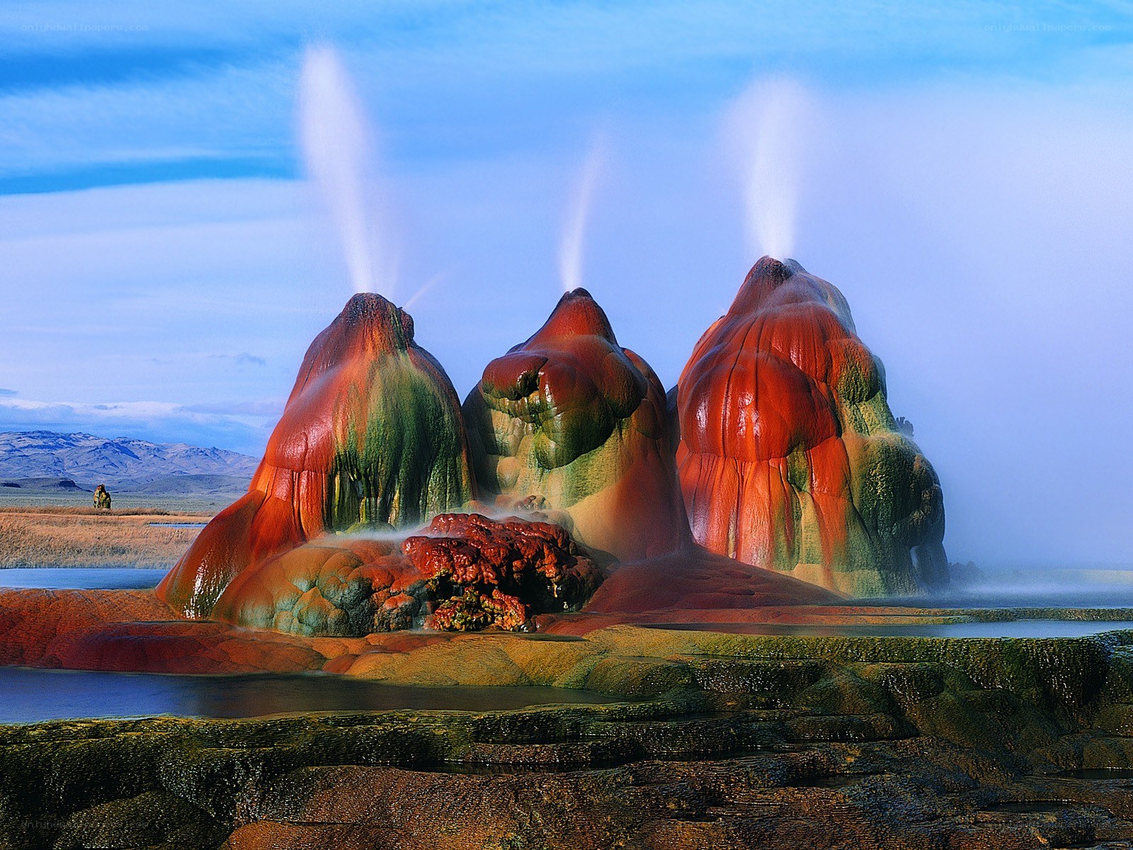 Colorful geysers erupting