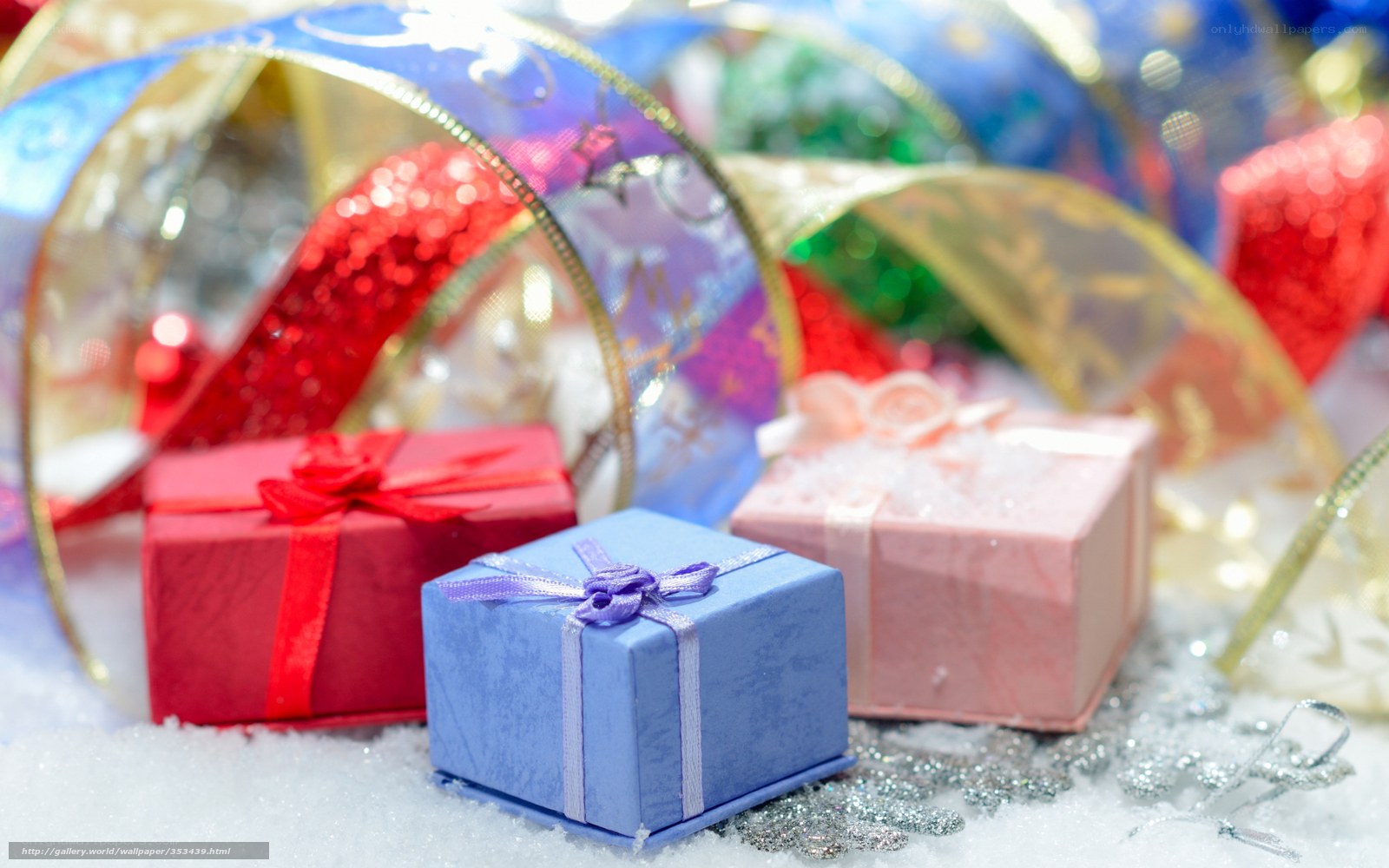 colorful gift boxes in snow