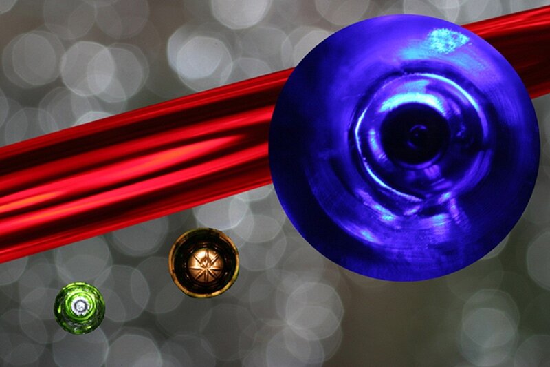 Colorful glass beads on red ribbon
