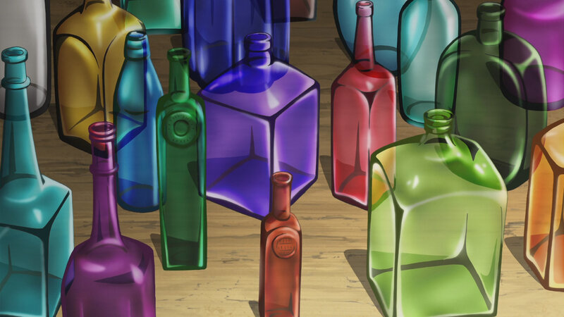 Colorful glass bottles on wood