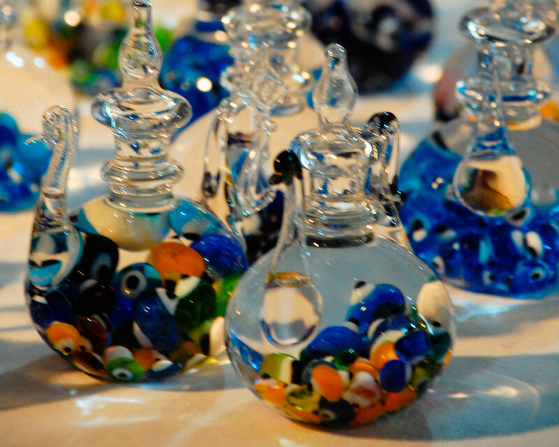 Colorful glass figurines on display