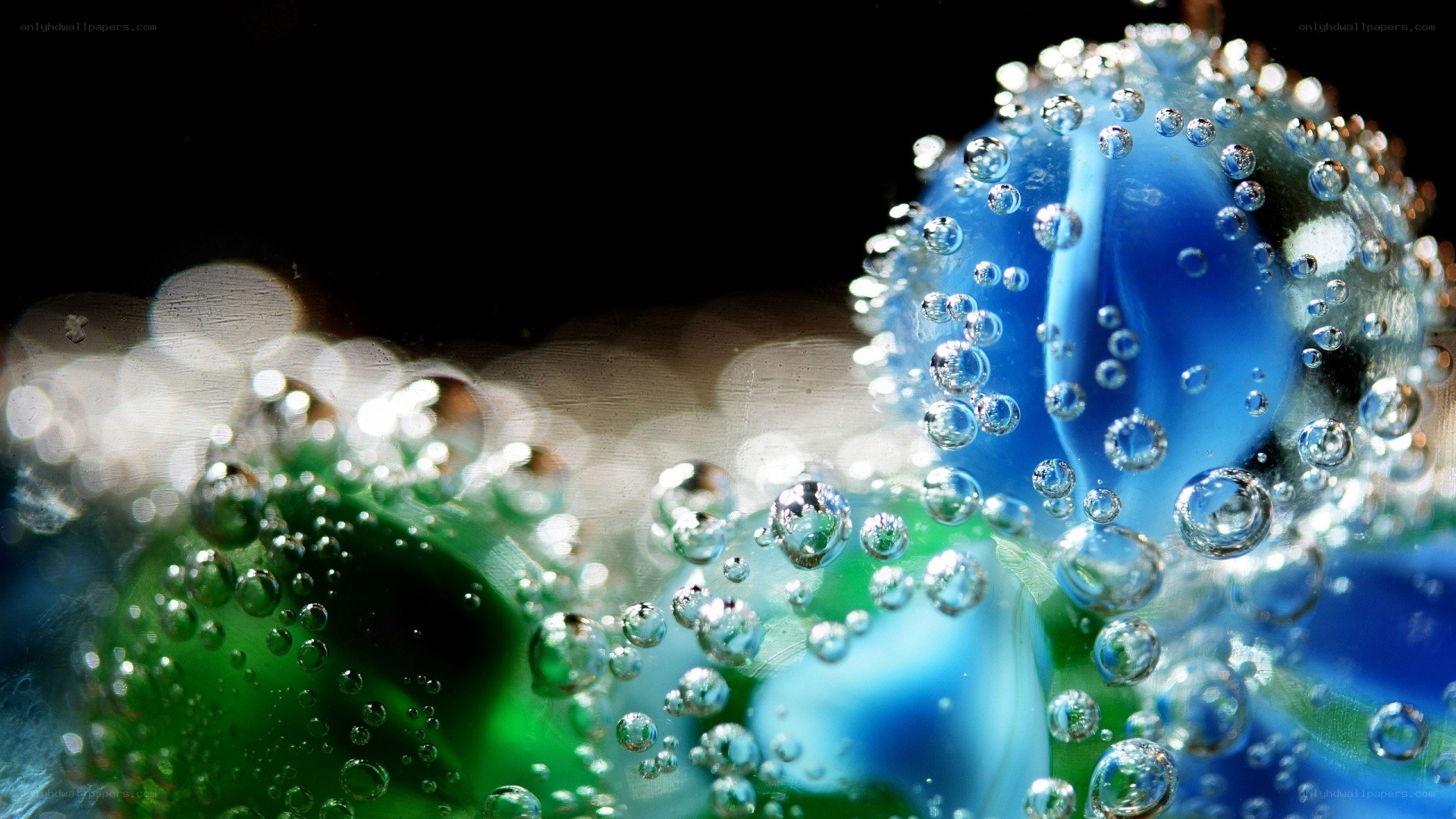 Colorful glass marbles with bubbles