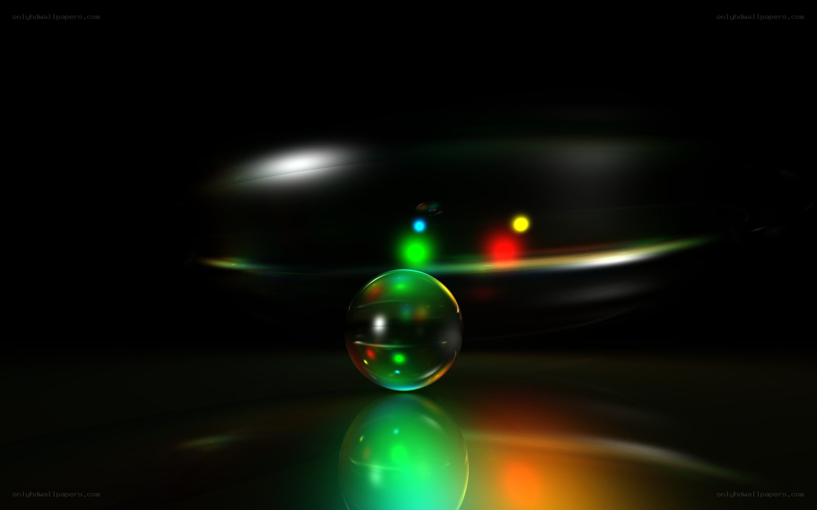 Colorful glass sphere on dark surface