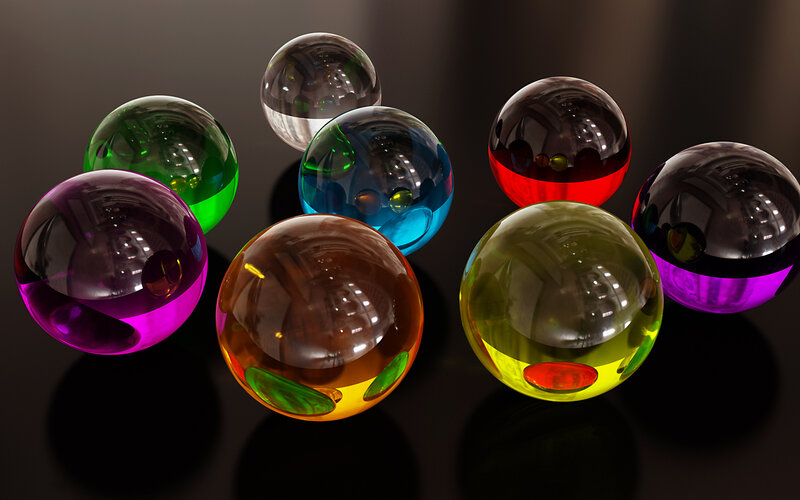 Colorful glass spheres on black