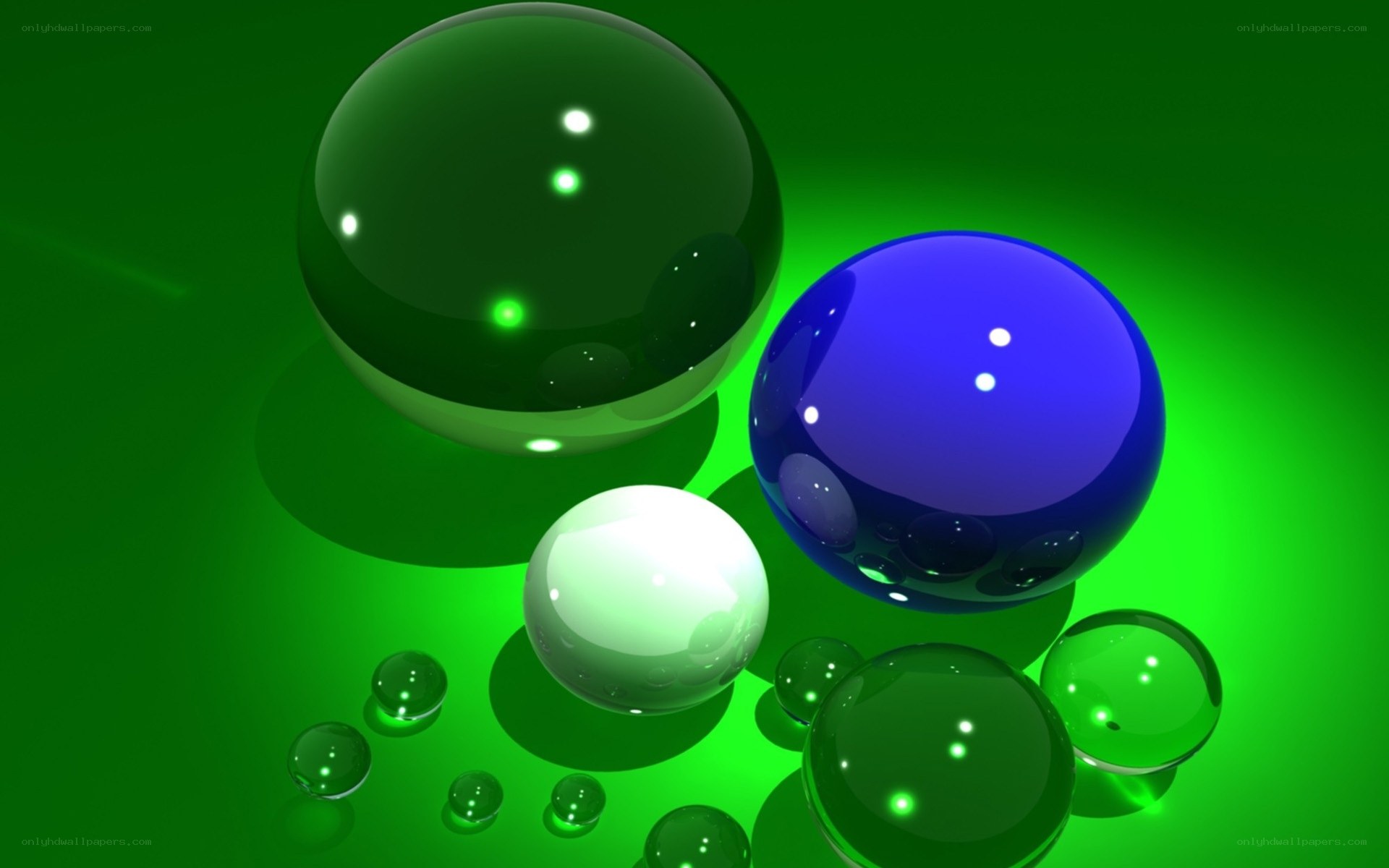 Colorful glass spheres on green