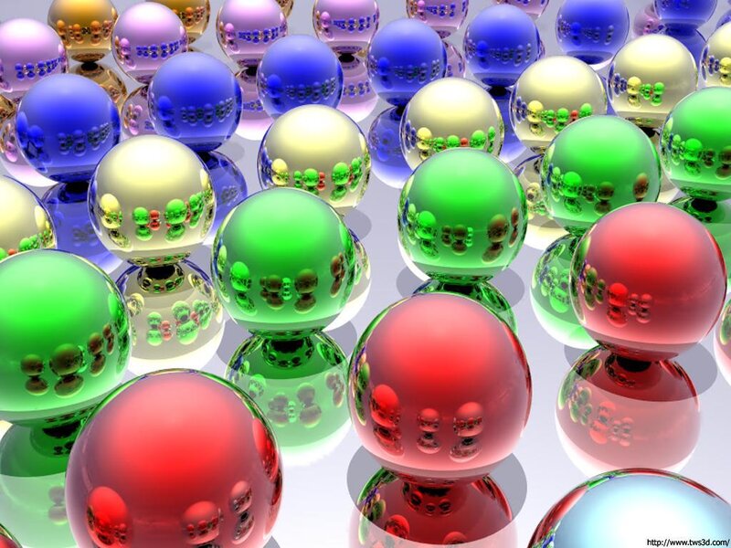 Colorful glass spheres on reflective surface