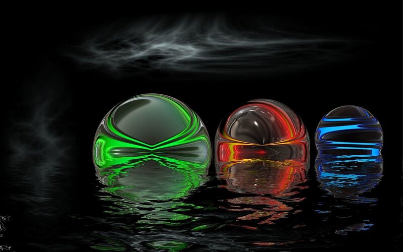 Colorful glass spheres on water