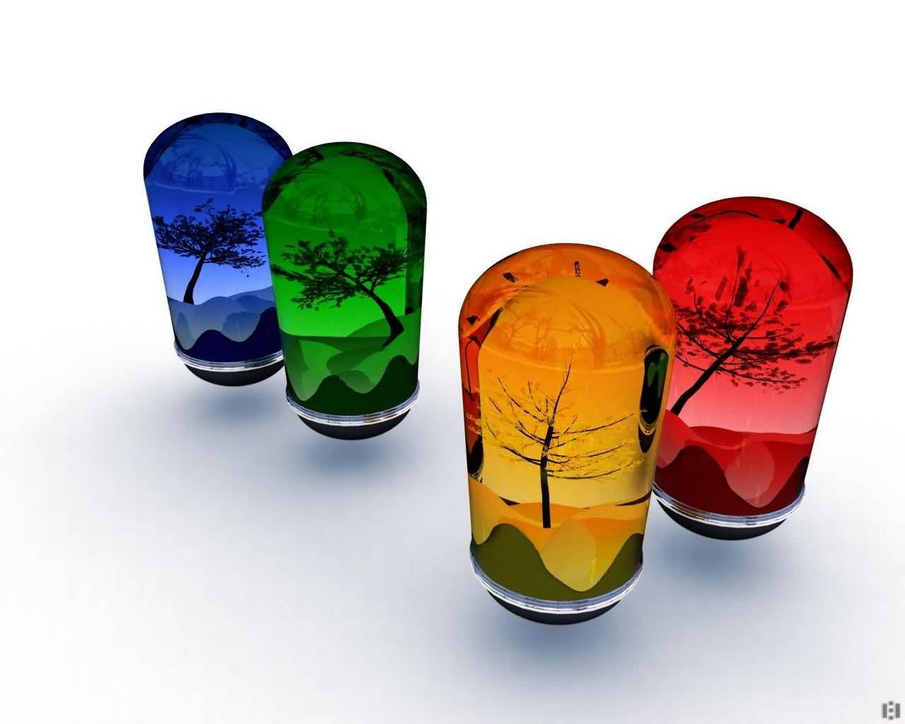 Colorful glass vials with tree scenes