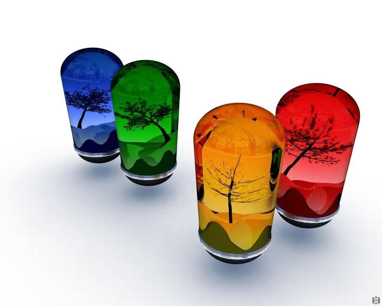 Colorful glass vials with tree scenes