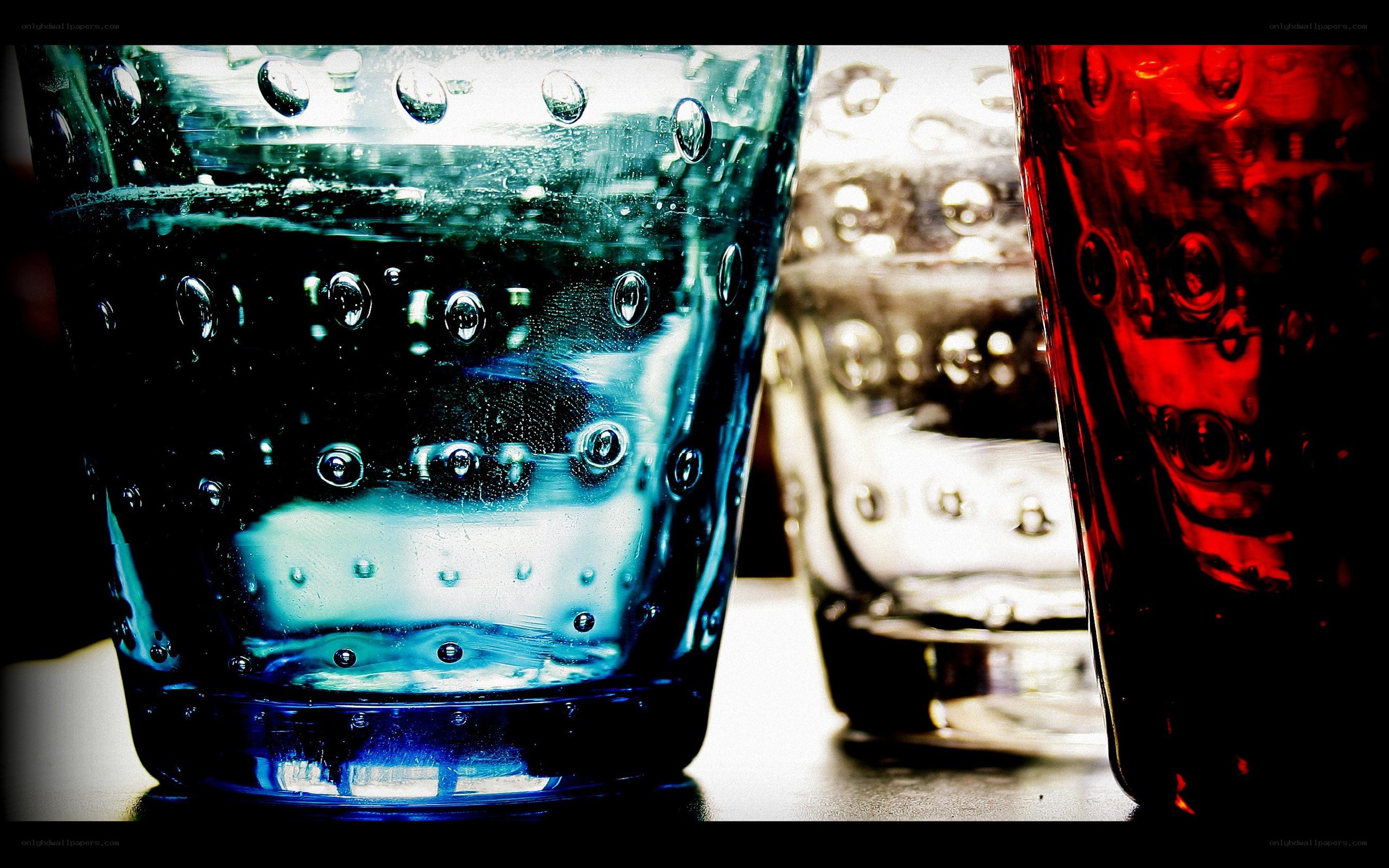 Colorful glassware with bubbles