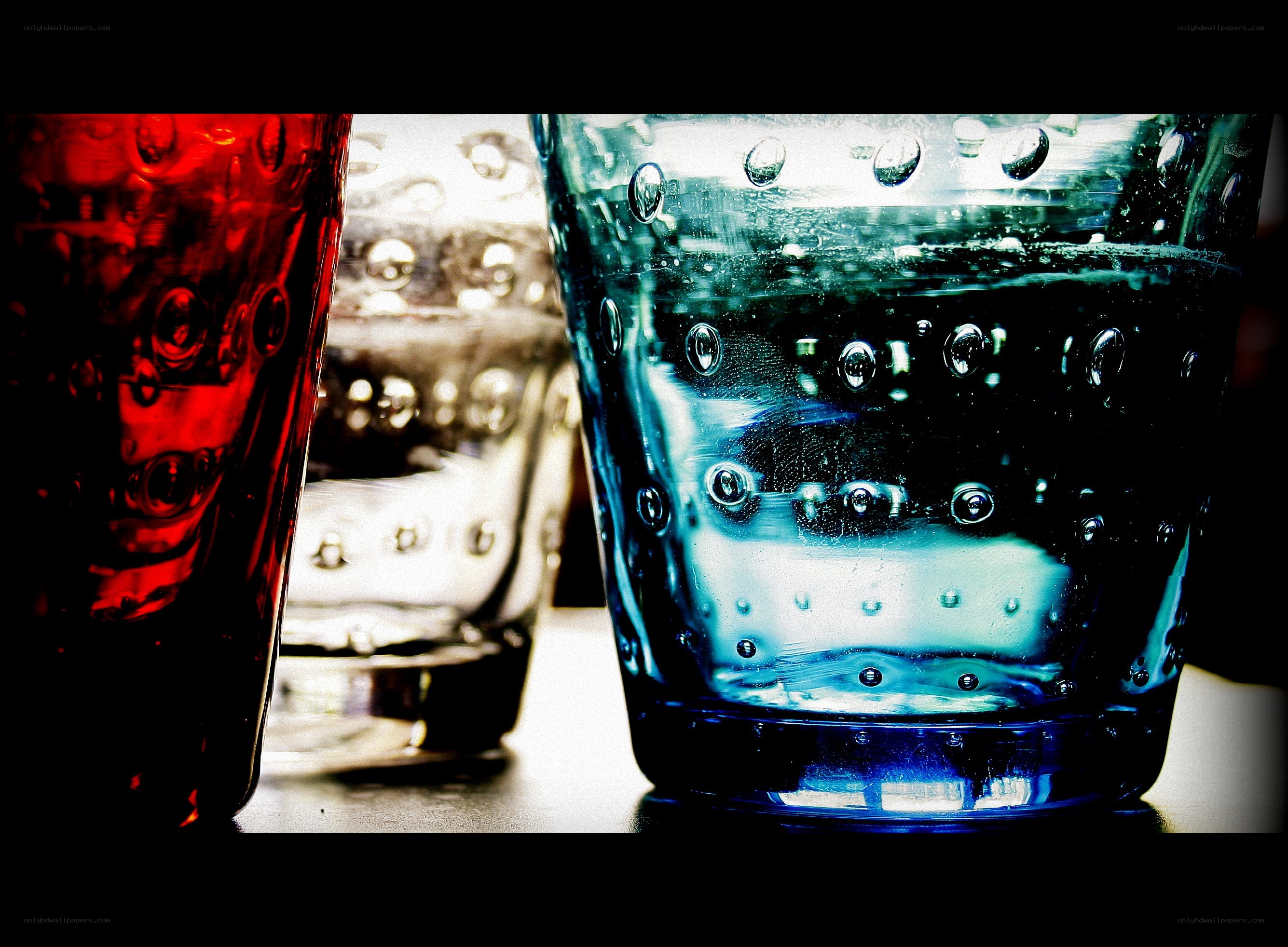 Colorful glassware with bubbles