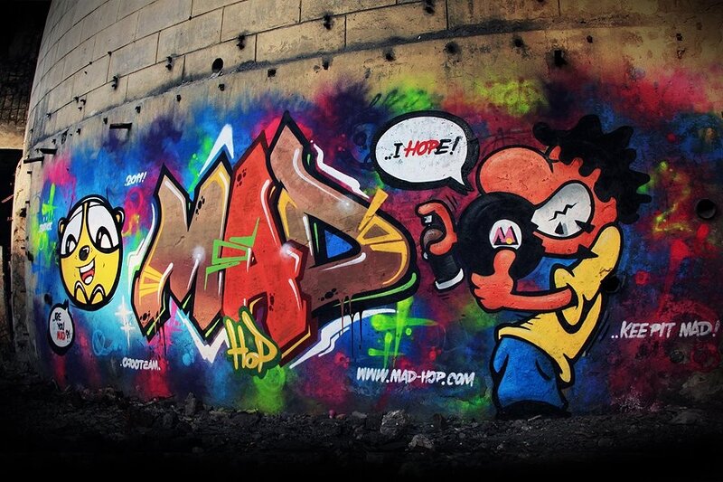 Colorful graffiti art on concrete wall