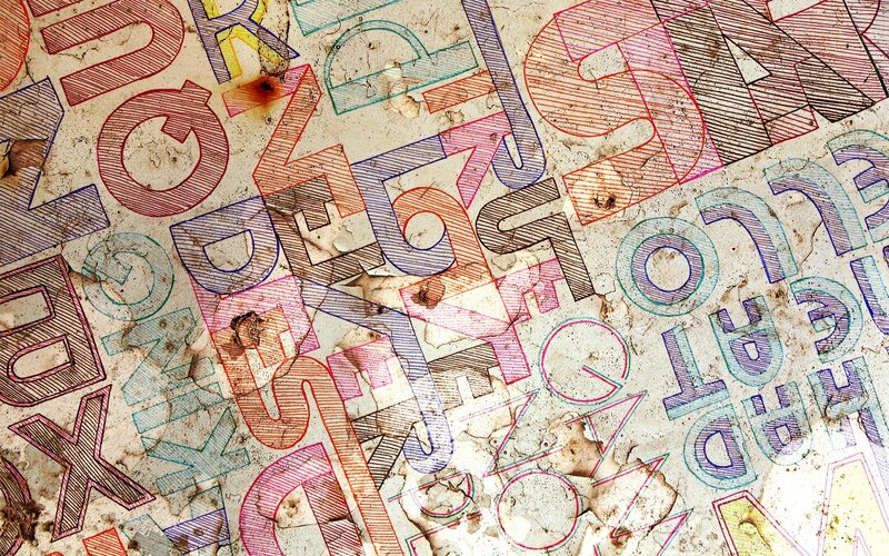 colorful graffiti letters on concrete