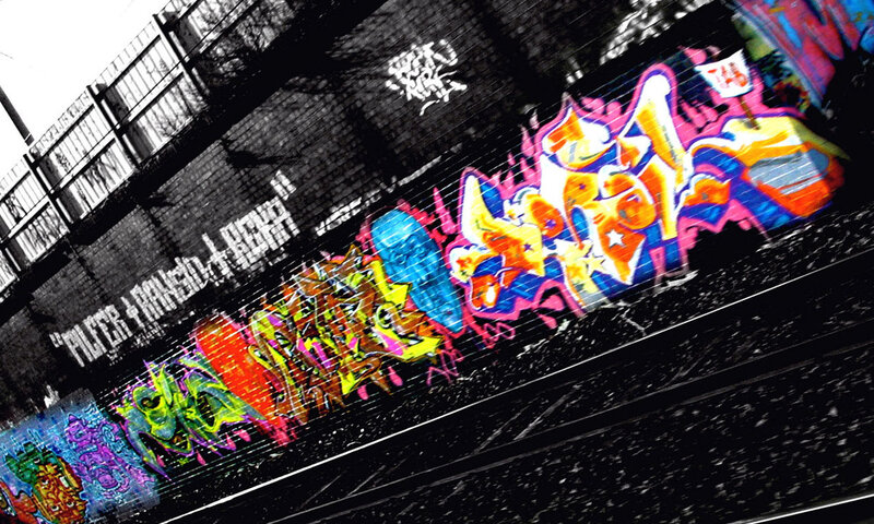 colorful graffiti on a brick wall