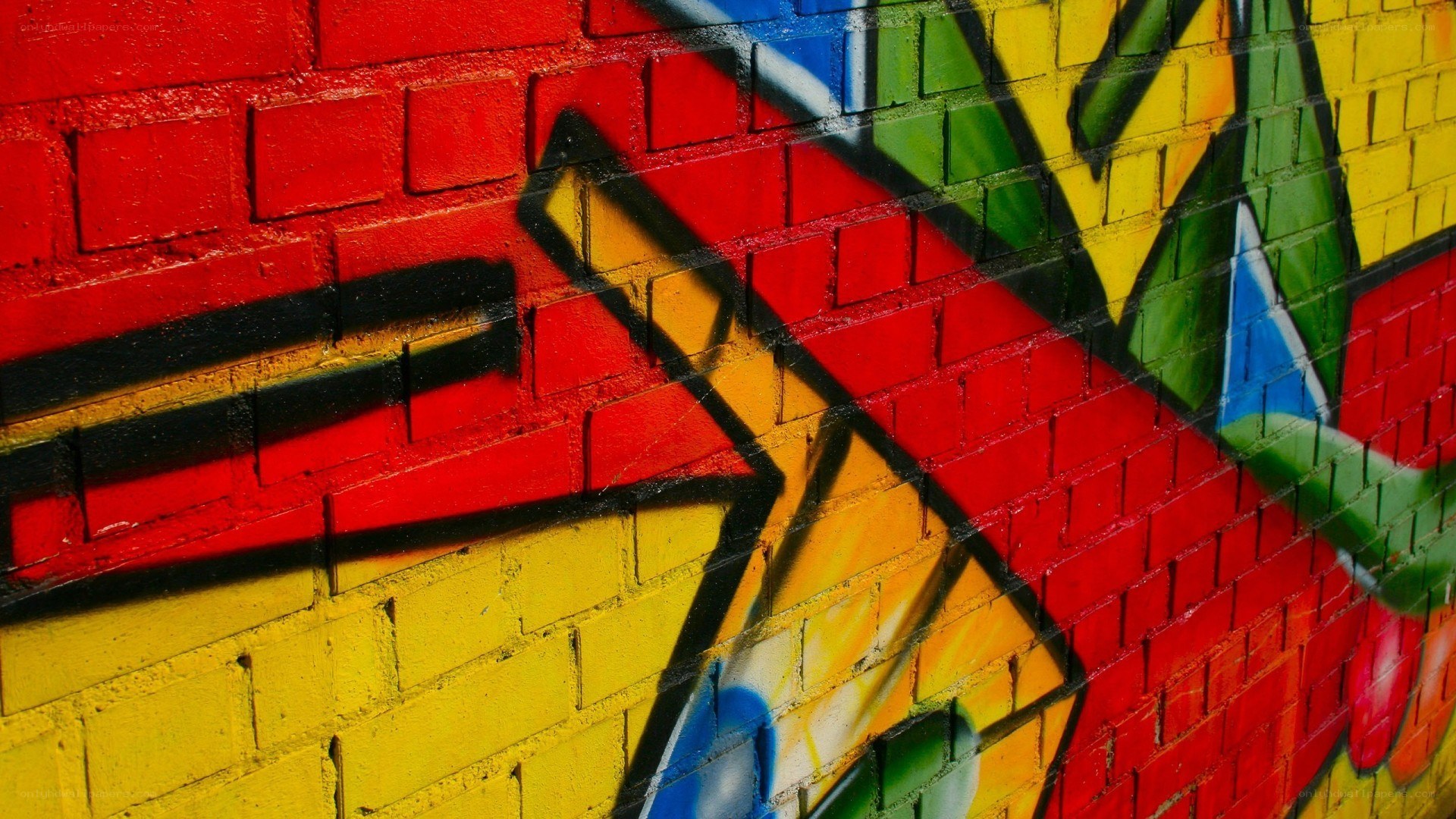 colorful graffiti on brick wall