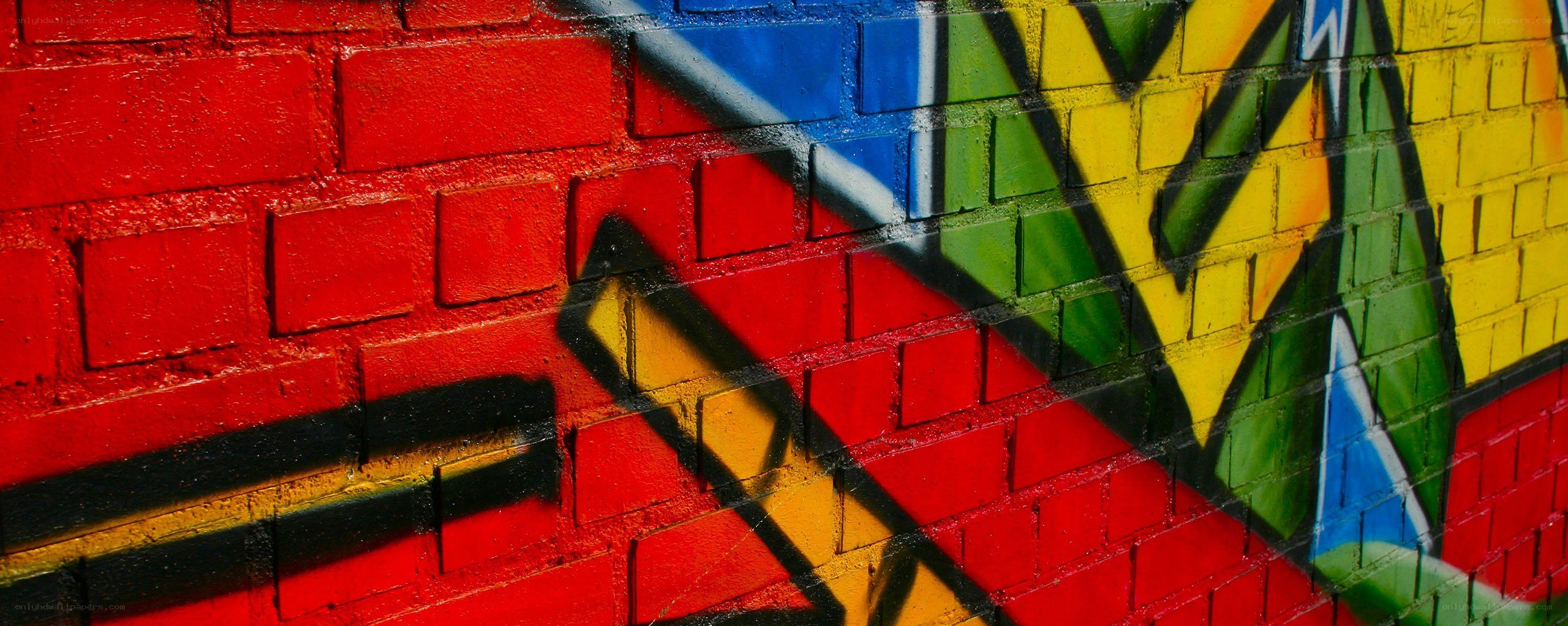 colorful graffiti on brick wall