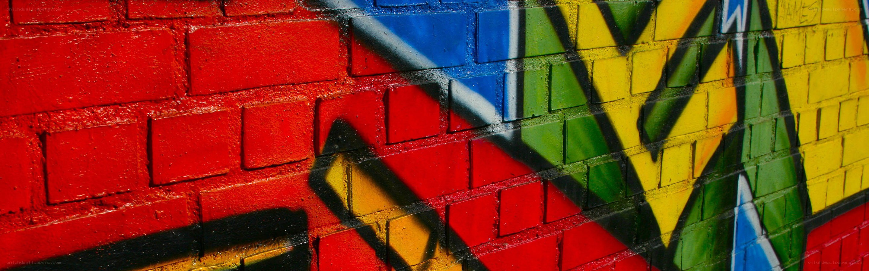 colorful graffiti on brick wall