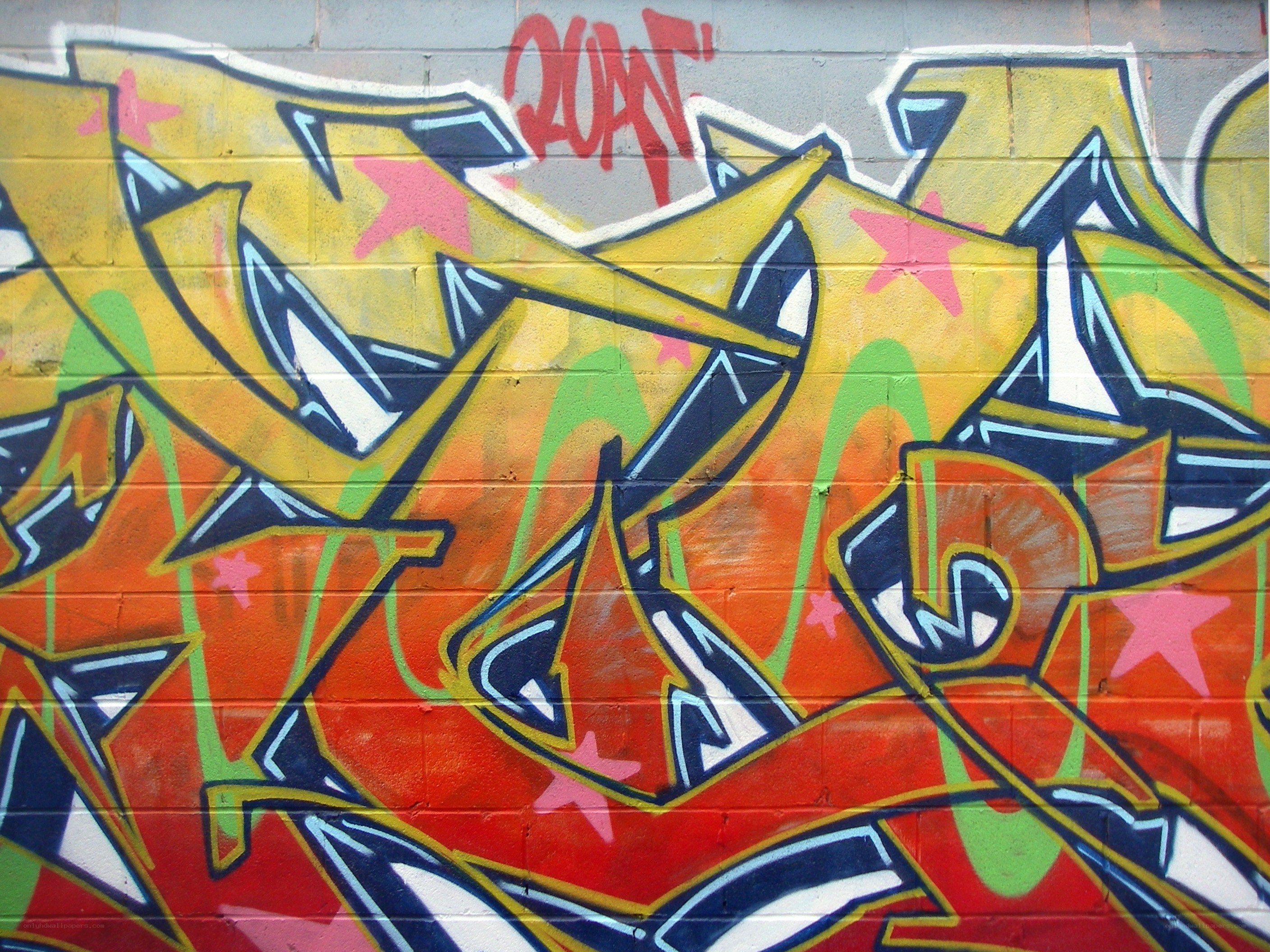 colorful graffiti on brick wall