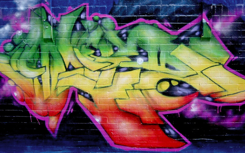 colorful graffiti on brick wall