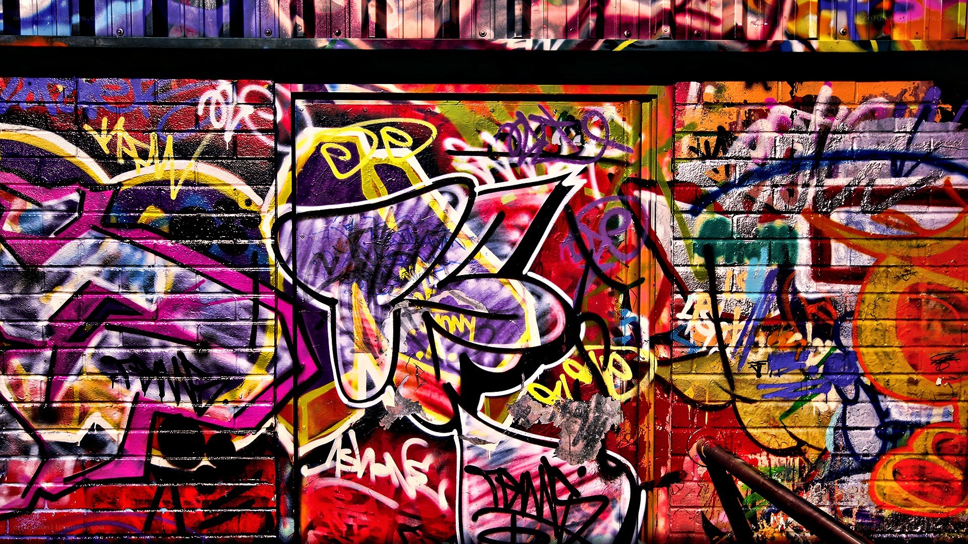 colorful graffiti on brick wall
