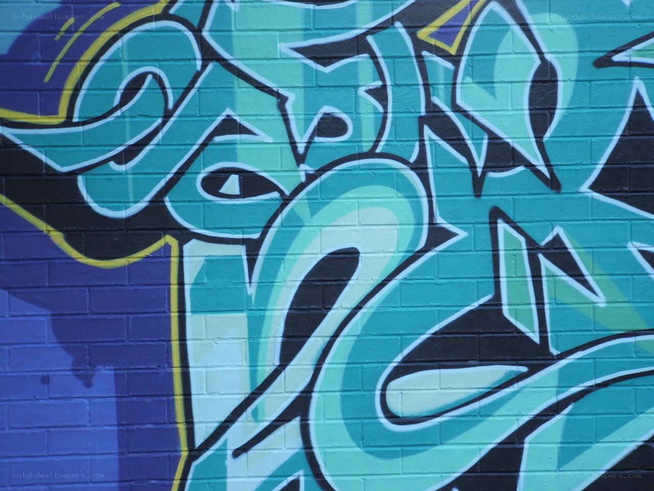 colorful graffiti on brick wall