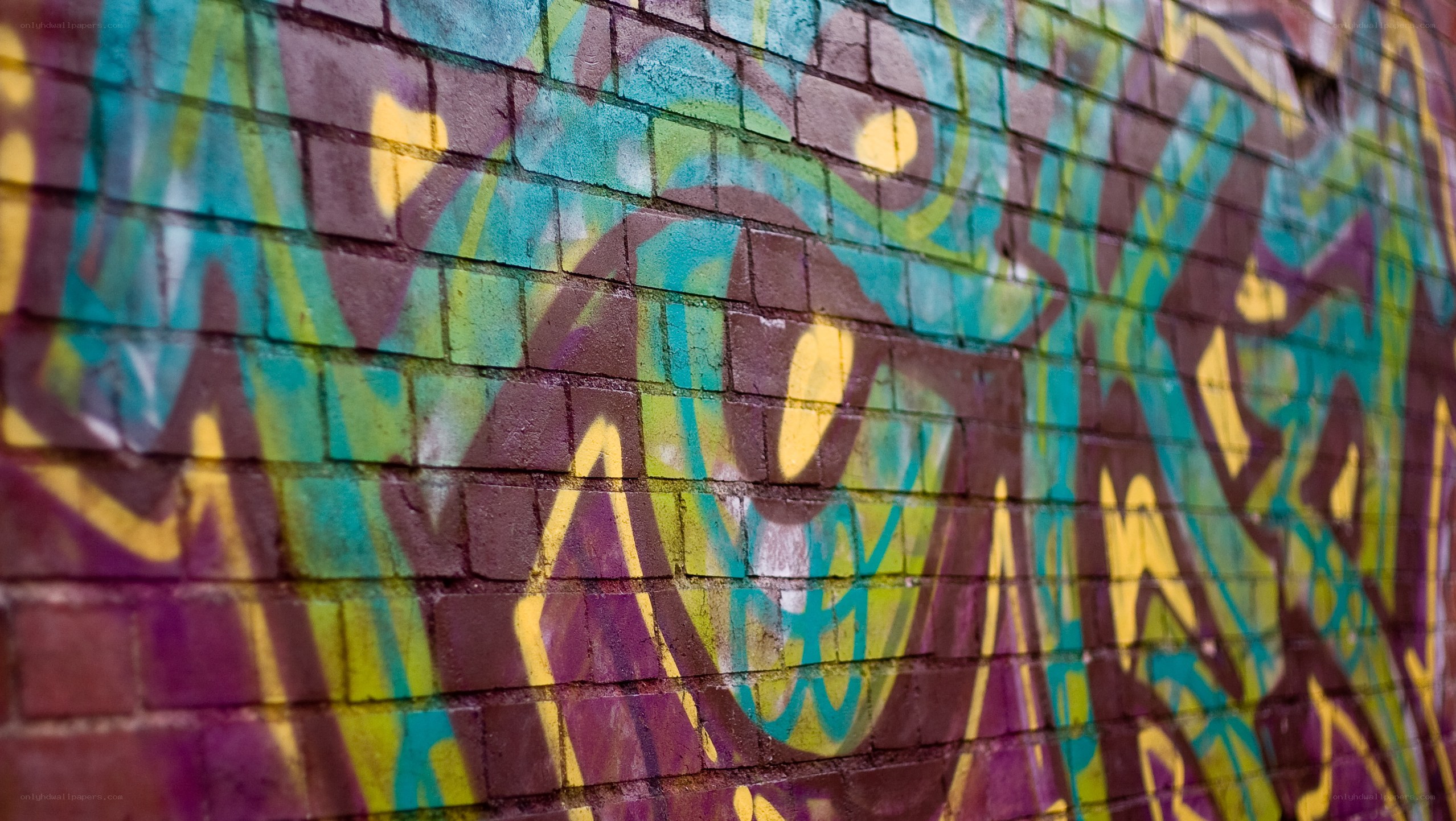 colorful graffiti on brick wall
