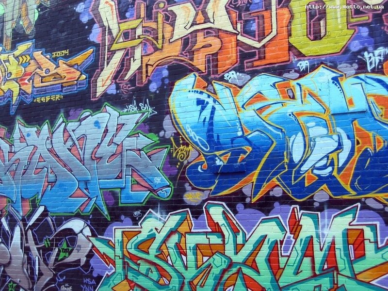 Colorful Graffiti on Brick Wall — Blue