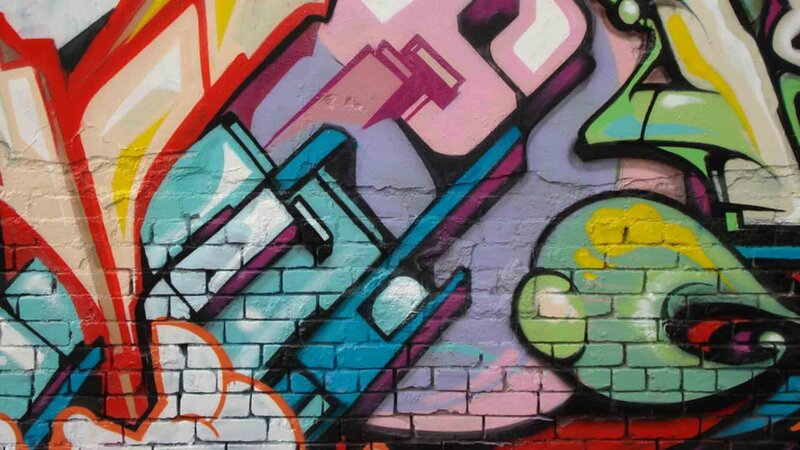 Colorful Graffiti on Brick Wall — Pink