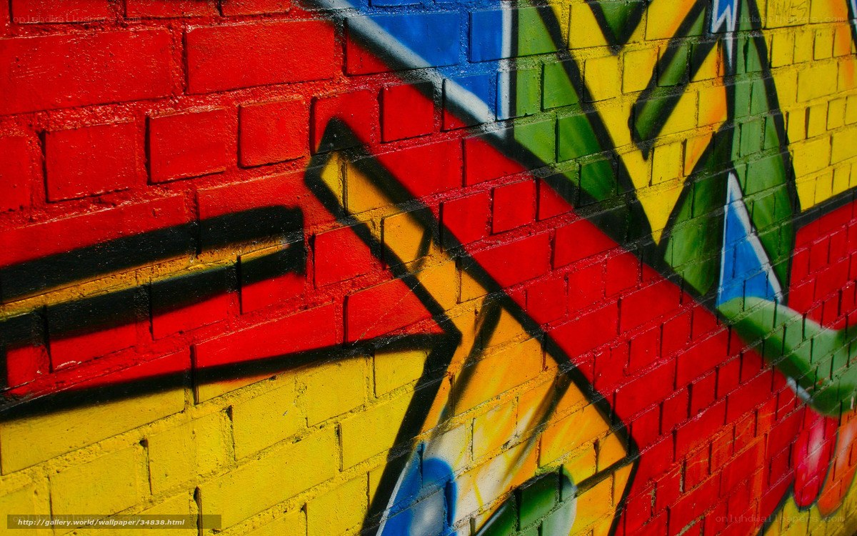 Colorful graffiti on brick wall