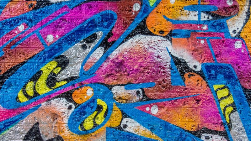Colorful Graffiti on Wall — Blue, Vibrant, Painting