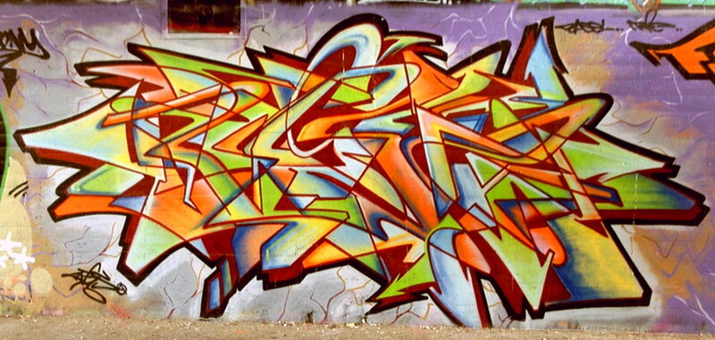 Colorful Graffiti on Wall — Green, Vibrant