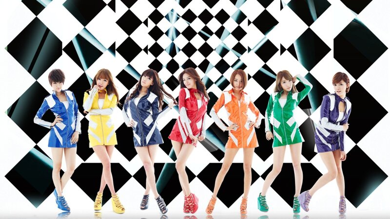 colorful group of women posing
