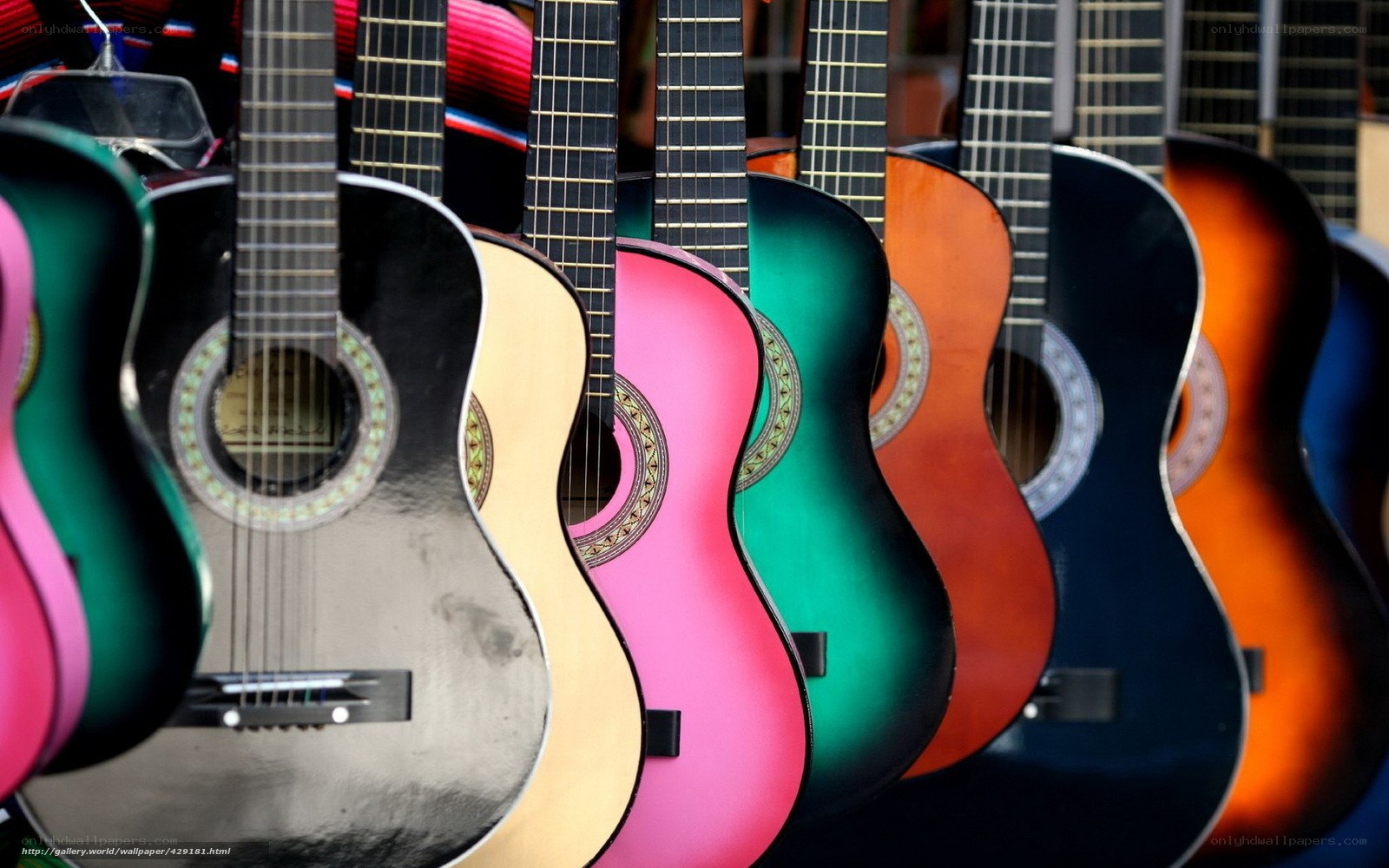 Colorful guitars in a row