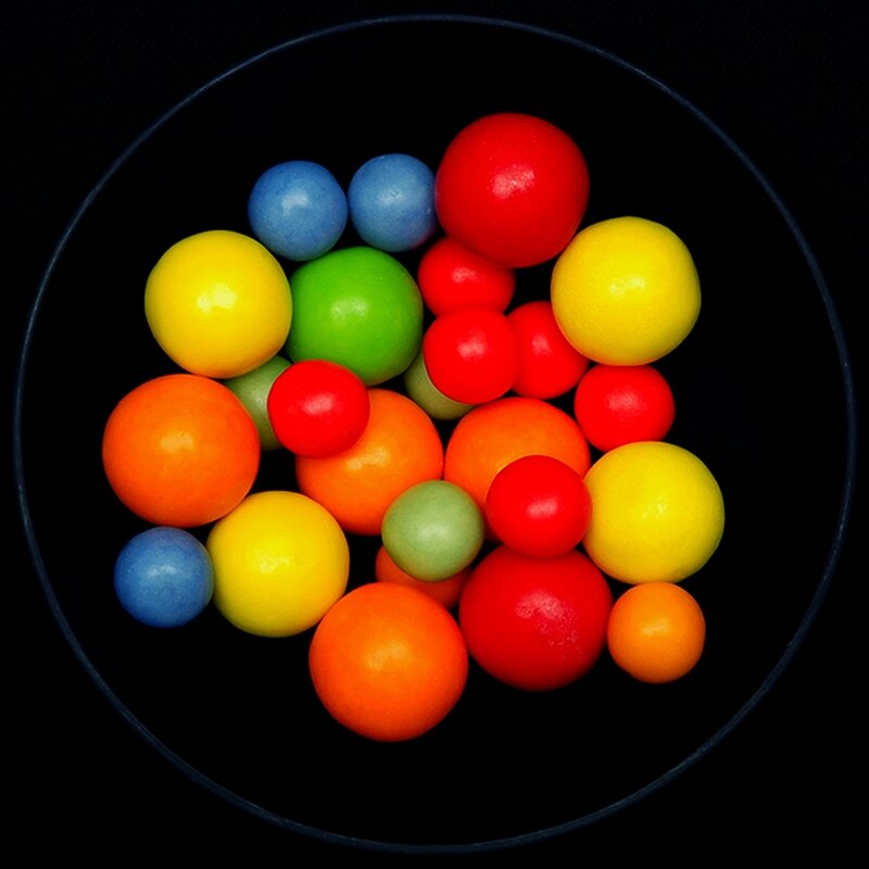 Colorful gumballs in a bowl