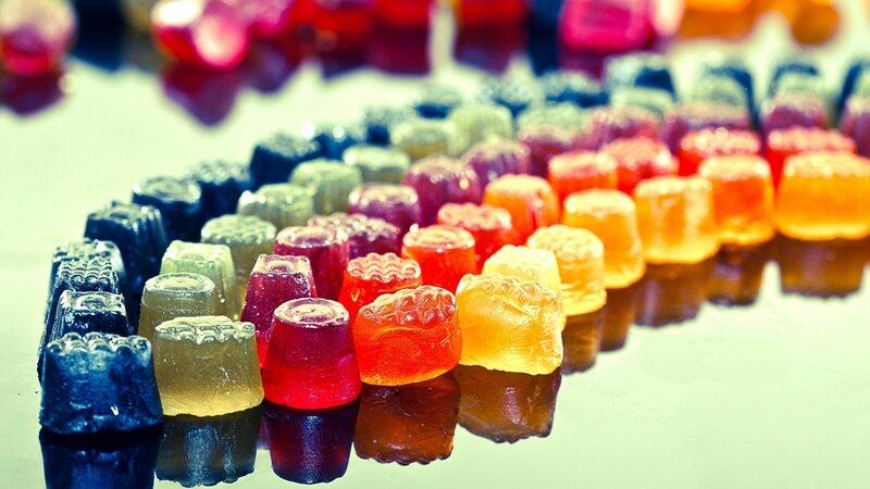 Colorful gummy candies in rows