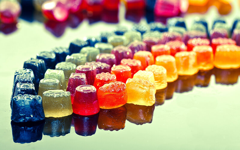 Colorful Gummy Candies — Red, Vibrant, Photograph, Reflection