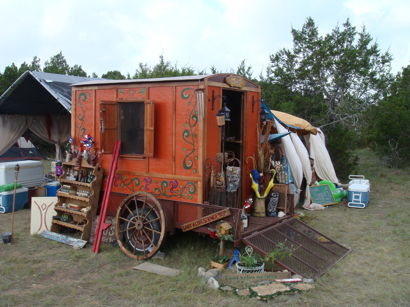 colorful gypsy wagon at campsite