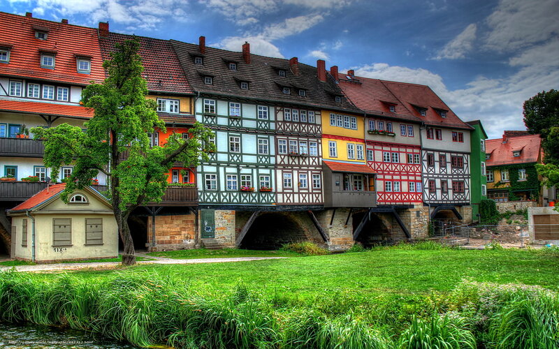 Colorful half-timbered houses by river