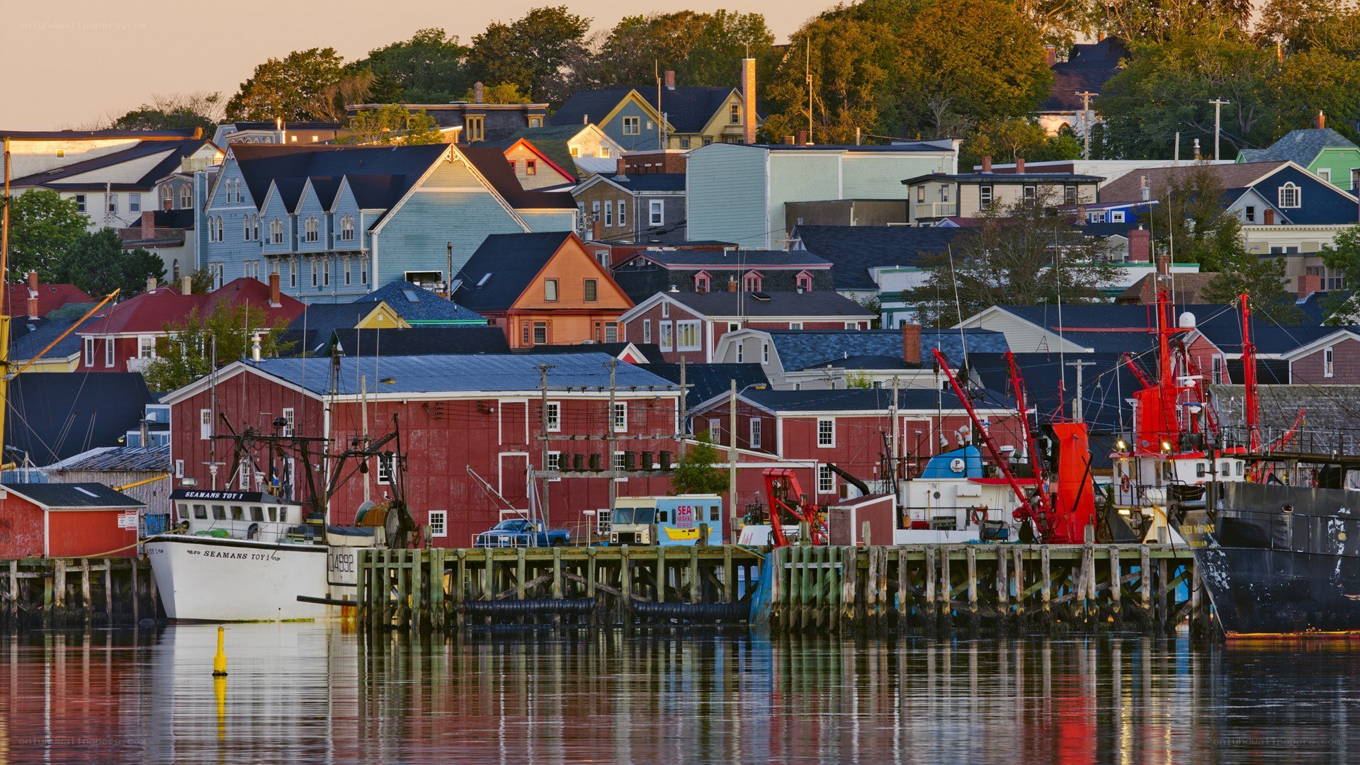 Colorful harbor town at sunset