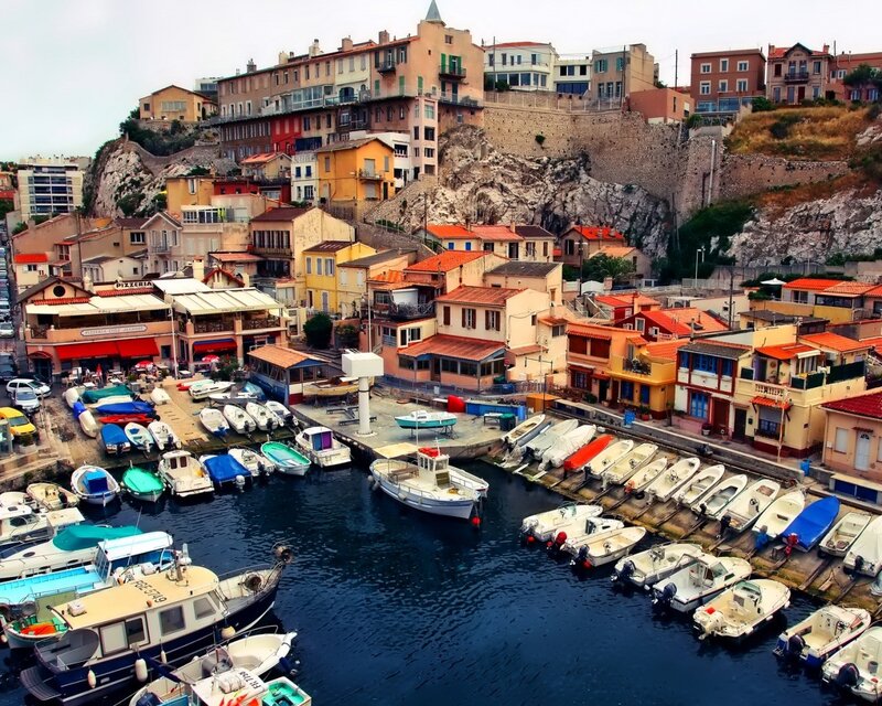 Colorful harbor village on a hillside
