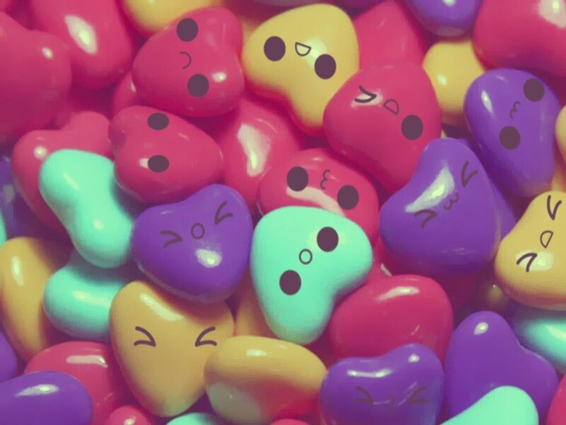 colorful heart candies with faces