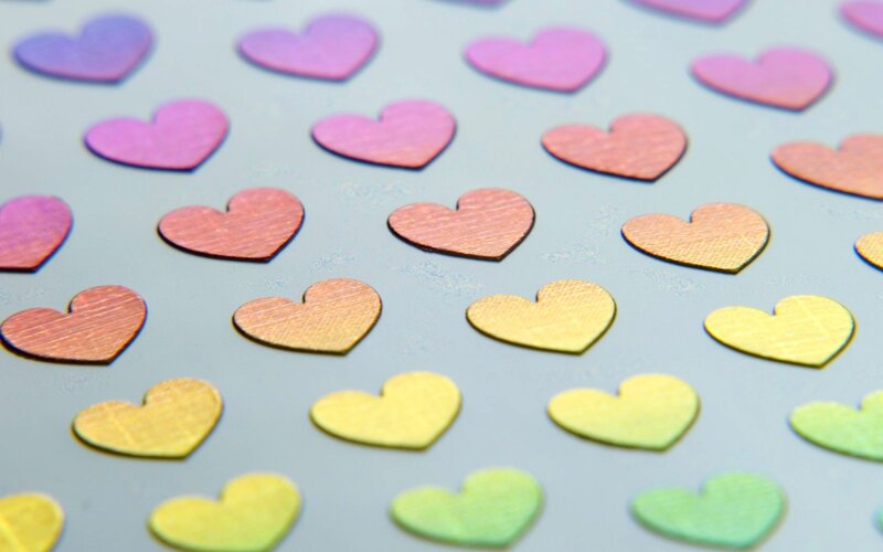 Colorful heart confetti pattern