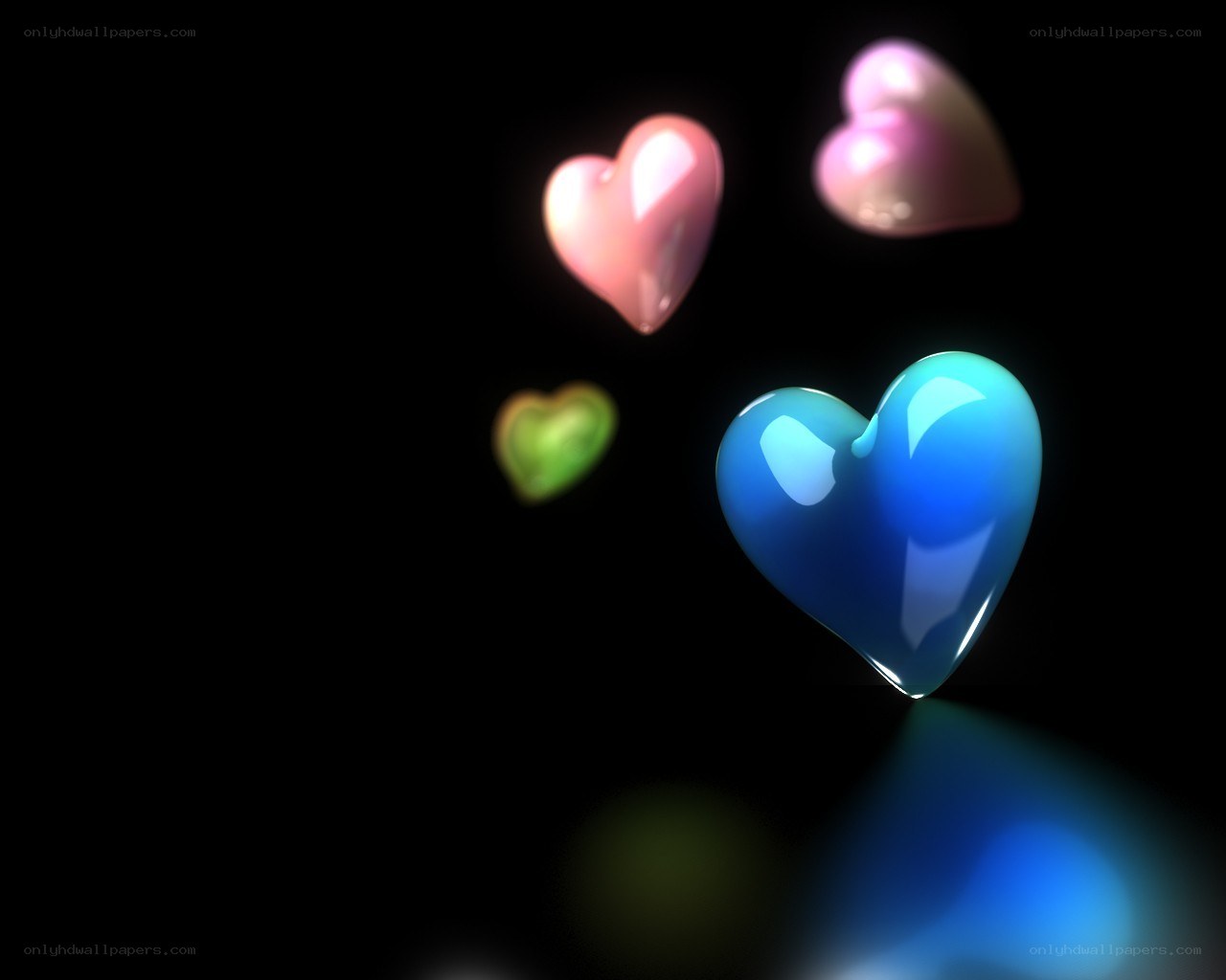 Colorful hearts floating in darkness