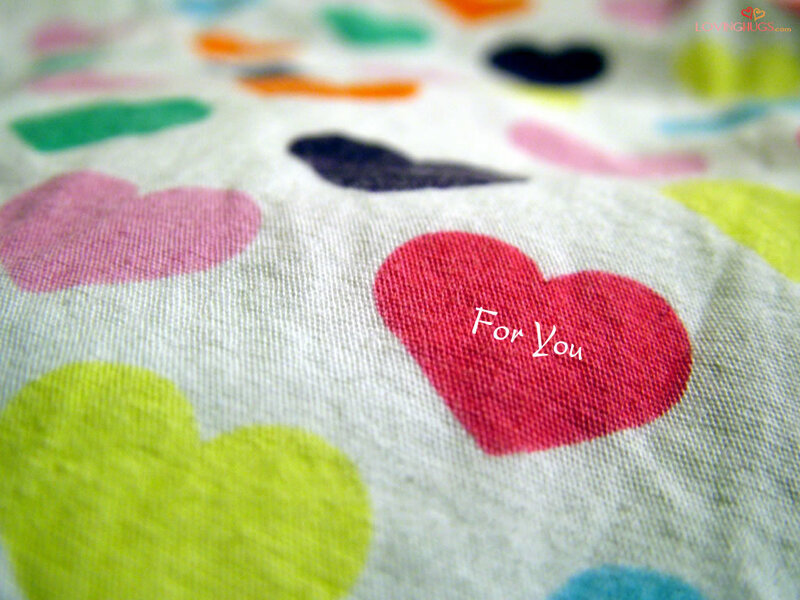 Colorful hearts on fabric