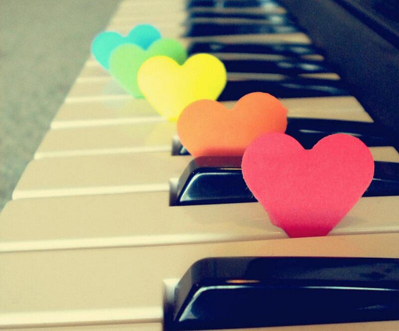 Colorful Hearts on Piano Keys
