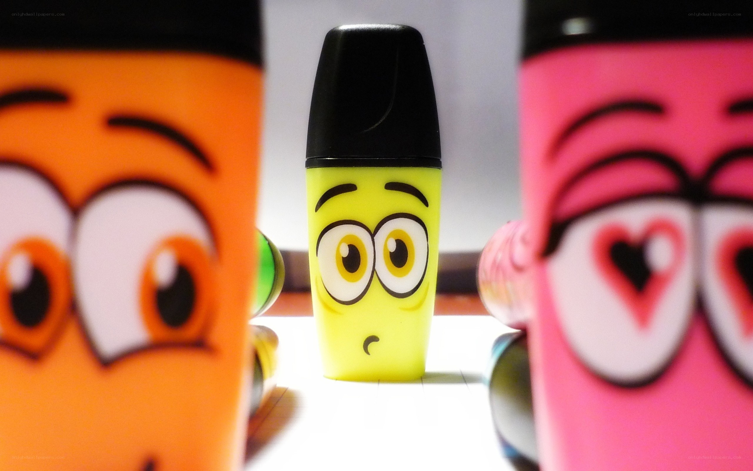 Colorful highlighters with faces